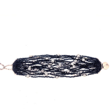 Brazalete cosecha 15 hilos plata.